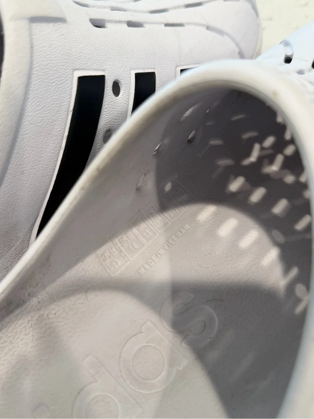 adidas Kids White Slip-On Clogs with Black Stripes